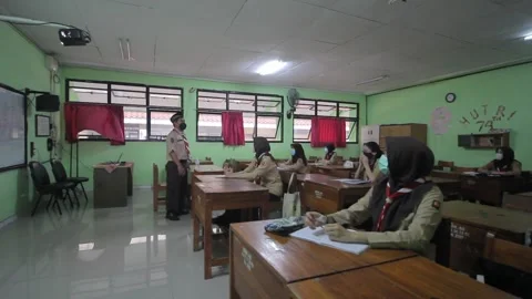 STUDENT STUDY IN CLASS IN NEW NORMAL ERA, IN PANDEMIC SITUATION. NEWS Stock Footage 151823472