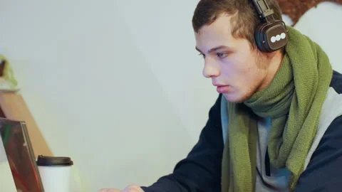 Student studying attentively. Young man engaged in learning. Bright study area Stock Footage 333304925