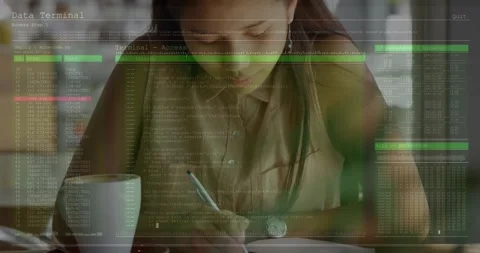 Student studying at cafe, camera pulling back revealing green terminal overlay Stock Footage 334858331