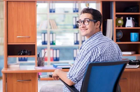 Student studying at home preparing for exam Stock Photos