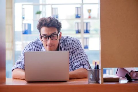 Student studying at home preparing for exam Stock Photos