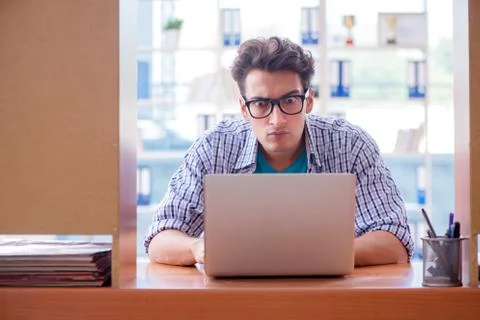 Student studying at home preparing for exam Stock Photos