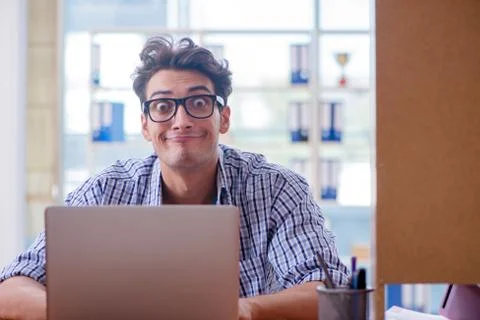 Student studying at home preparing for exam Stock Photos