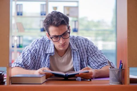 Student studying at home preparing for exam Stock Photos