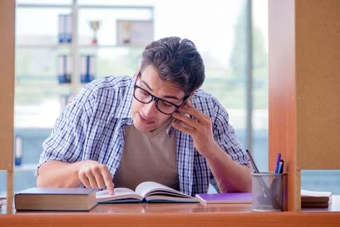Student studying at home preparing for exam Stock Photos