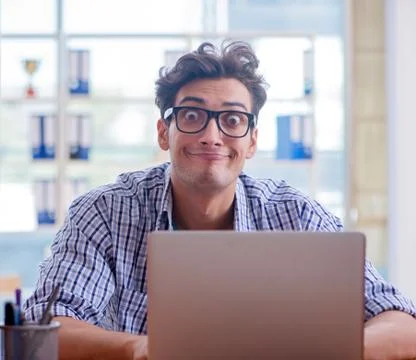 Student studying at home preparing for exam Stock Photos