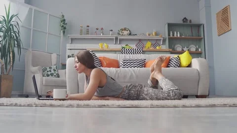 Student studying at home working with her laptop computer. Stock Footage 131090914