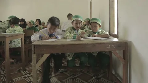 A student is studying jostling in a narrow school Stock Footage 224928533