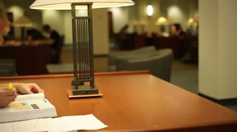 Student studying in library. Stock Footage 8851134