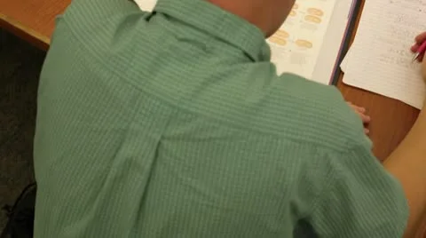 Student studying in library. Video stock 8853605