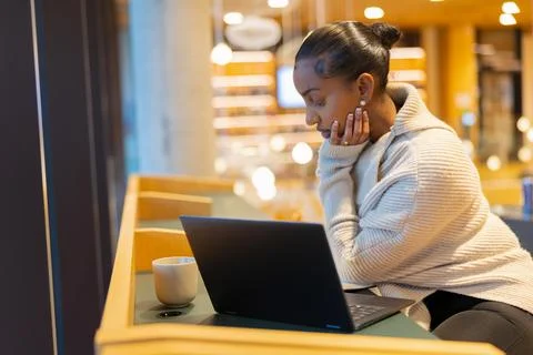 Student studying at a library Stock Photos