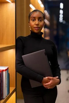 Student studying at a modern library Stock Photos