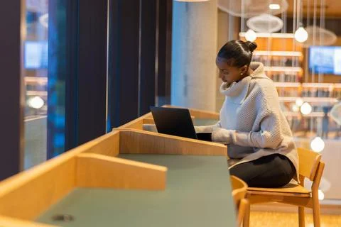 Student Studying in Modern Library Stock Photos