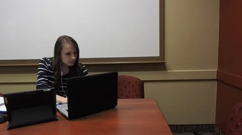 Student studying at a university library Stock Footage 51201444