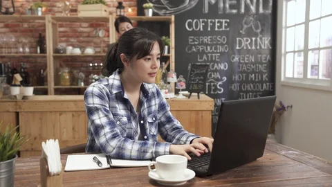 Student at table learning taking notes notebook Video stock 108381450