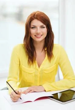 Student with tablet pc computer and notebook 스톡 사진