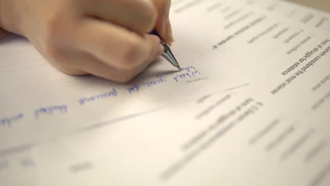 Student taking writing examination, having test at school or college Stock Footage 130071532