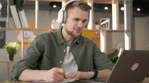 Student talking online video chat lesson. Learning courses and online education Stock Footage 153506696