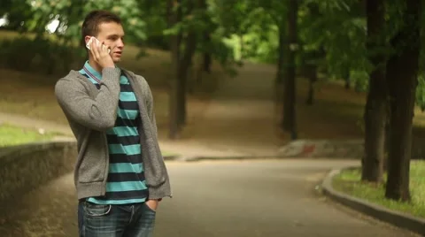 Student is talking on the phone after school.mp4 Stock Footage 50528212