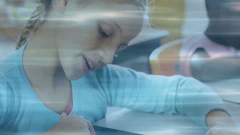 Student tapping and swiping tablet for learning, causing reflections with light Stock Footage 313330029