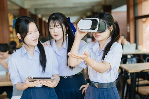 Student teen using modern technology VR digital device for education learni.. Stock Photos