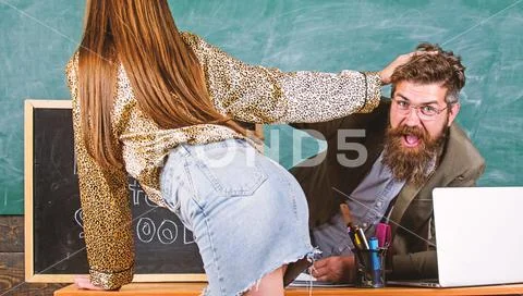 Student temptress. School behaviour discipline and rules. Sexy seduction Stock Photos