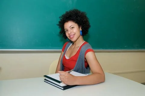 Student with text book in class Stock Photos