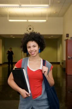 Student with text book hallway Foto stock