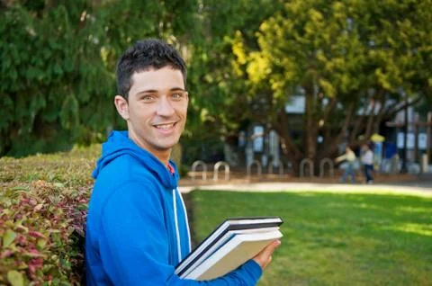Student with text book Stock Photos