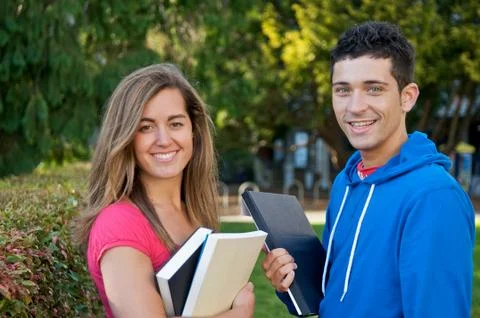 Student with text book Stock Photos