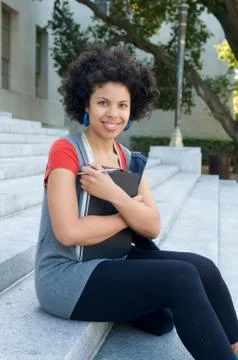 Student with text book Stock Photos