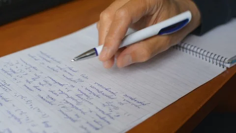 Student thinking hard doing homework or writing exam test hand close-up 스톡 동영상 91804654