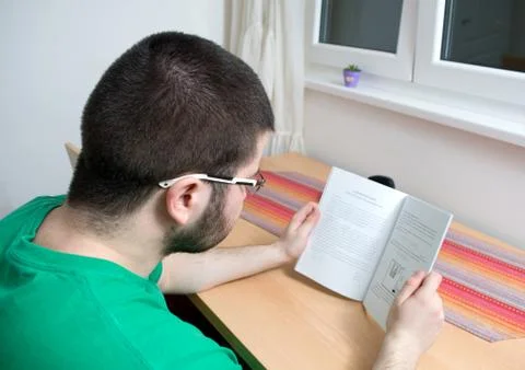 Student trying out different ways of learning Stock Photos
