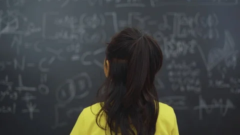 Student trying to solve question math in class Stock Footage 113052515
