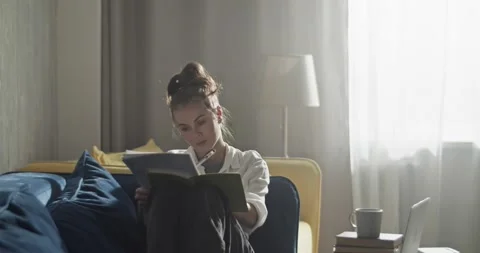 Student typing on laptop and studying at home Stock Footage 172146996