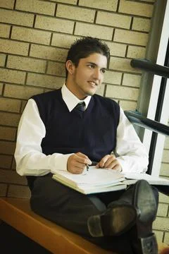 A Student In Uniform, Studying Stock Photos