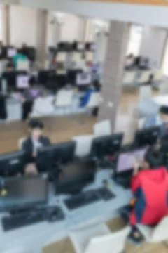 Student use computer to access to internet for education in university (blurr Stock Photos