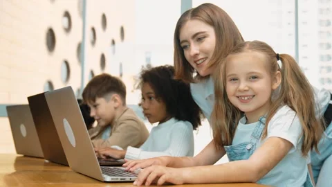 Student use laptop writing code while teacher explain about program. Erudition. Stock Footage 270207020