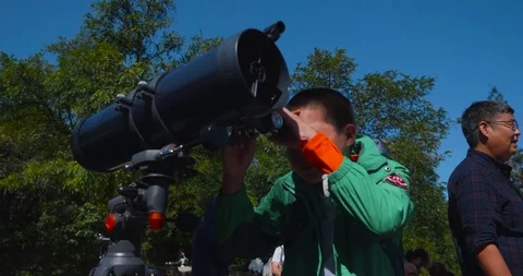 Student use the telescope China Stock Footage 97421069