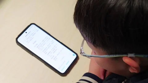 Student uses DEEPSEEK for info Stock-Footage 303252869