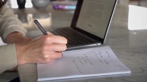 Student using AI chatbot on laptop PC to do homework for school Stock Footage 243905255