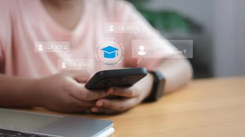 Student using AI chatbot for online learning on smartphone Stock Photos