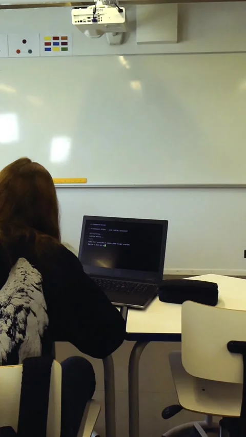 Student using artificial intelligence for coding homework 動画素材 347064775