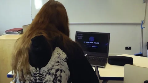 Student using artificial intelligence homework helper on laptop Stock Footage 344104649