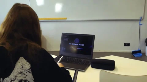 Student using artificial intelligence homework helper on laptop Video stock 345479945