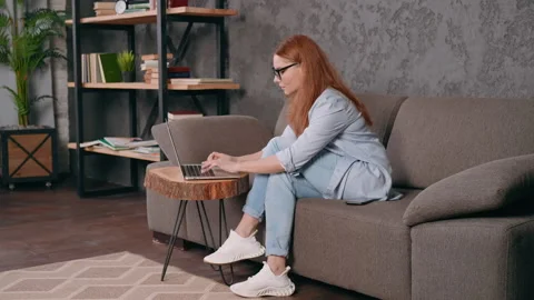Student using computer at home Stock Footage 171632707
