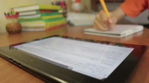Student using digital tablet and a notebook. Vídeo Stock 49931995