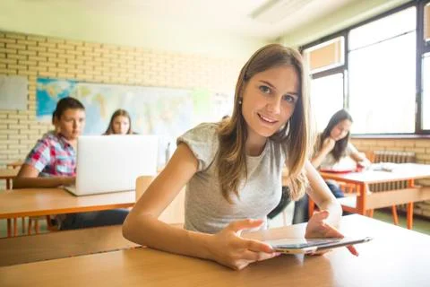 Student using digital tablet in classroom 写真素材