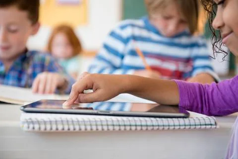 Student using digital tablet in classroom 스톡 사진
