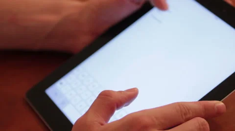 A Student is using an iPad Stock Footage 40357508